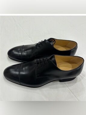 CHANEL. Men's Black Leather Cap-Toe Dress Shoes